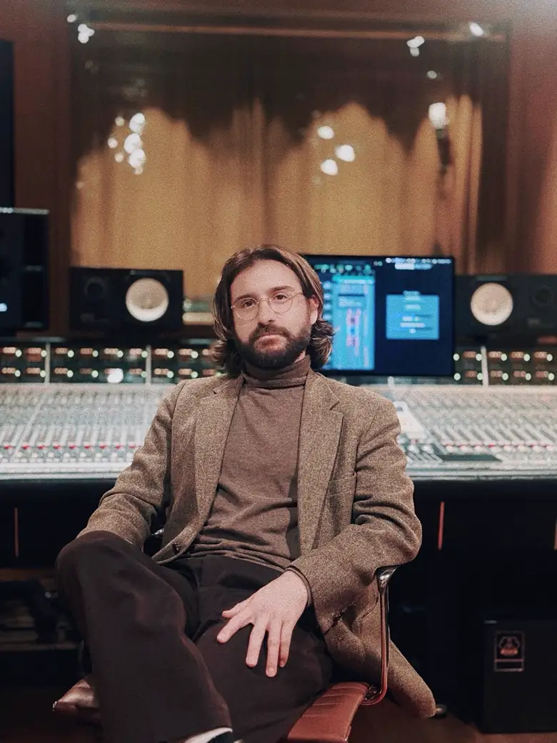 Michael J. Morgan working at a mixing console